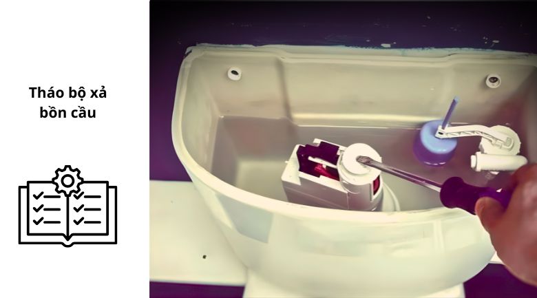 Tháo bộ xả bồn cầu